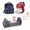 Versatile diaper bag with a built-in changing station for easy diaper changes